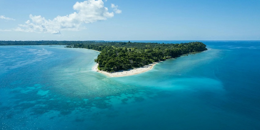 A drone shot of Neil Island with its turquoise waters that are ideal for snorkelling