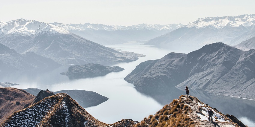A breathtaking view of snow-capped mountains at the famous Roys Peak in New Zealand