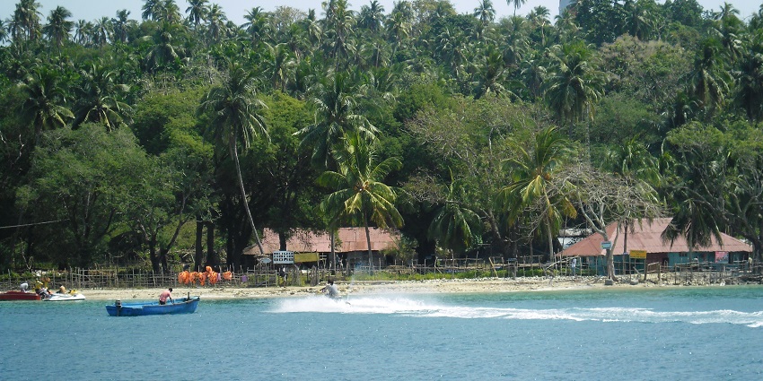 The view of North Bay Island near the Lighthouse with its lush greenery and blue water