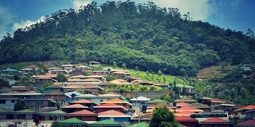 Scenic hill station with lush green - places to visit in India in June with family
