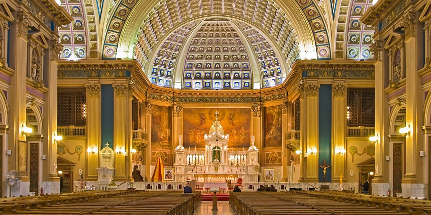 A picture of the majestic interiors of a church in Bekal with a traditional and well-lit ambience
