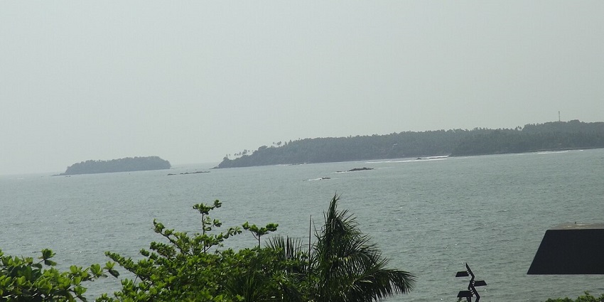 Sit and relax at the serene waters of Overbury's Folly on your trip to Kerala, India.