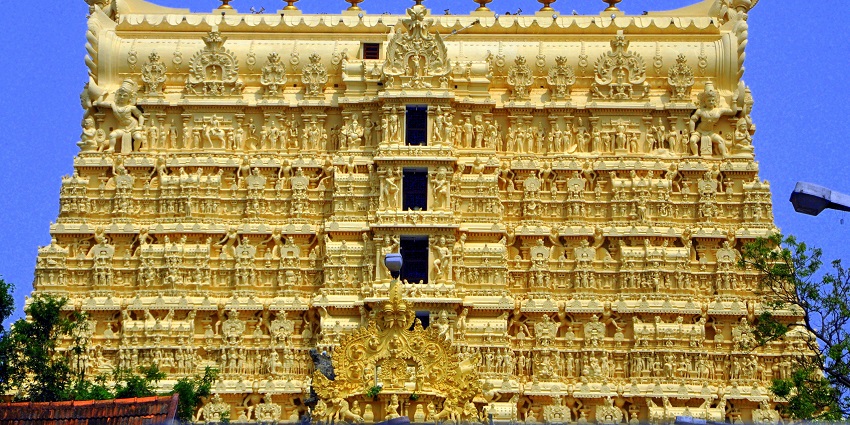 Witness the grandeur of the majestic Padmanabhaswamy Temple adorned in golden hues.