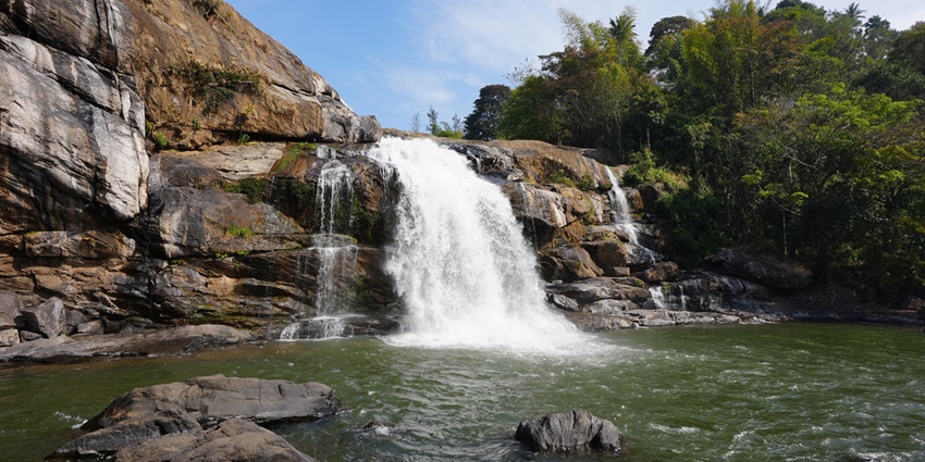 Beautiful snap of the waterfall passing through the hill - Pathanamthitta Waterfalls