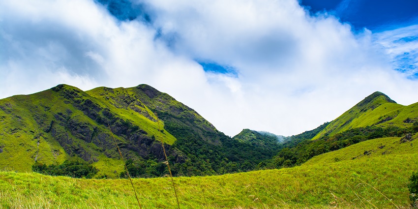 Enjoy the scenic vistas of Meenmutty Waterfalls, in the Wayanad district of Kerala.
