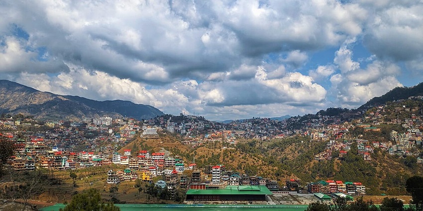 Aerial view of the city of Solan, one of the religious place to visit in Himachal in June
