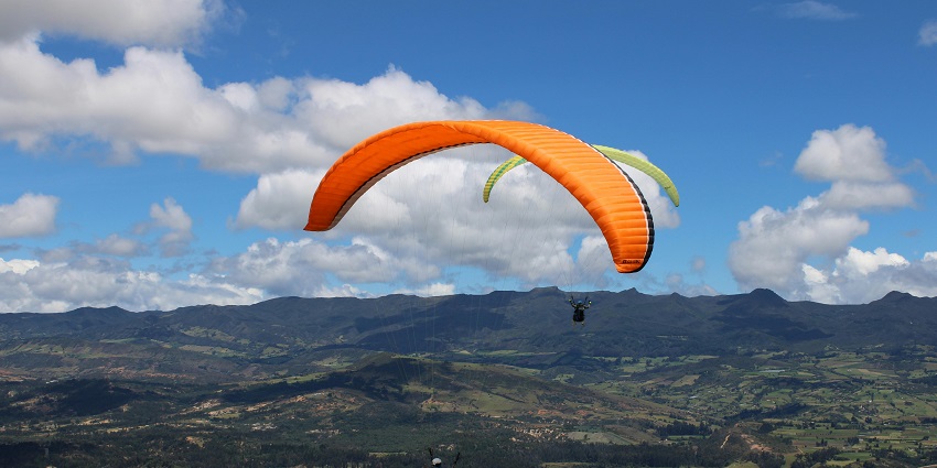Indulge in an exciting paragliding adventure, one of the best things to do in Vagamon.