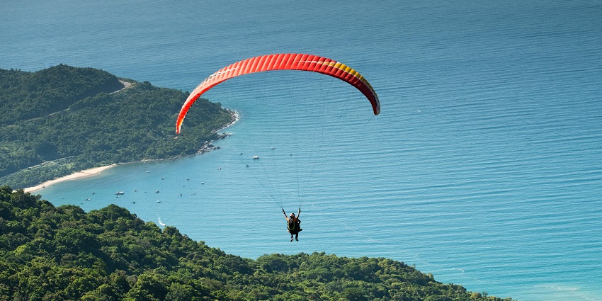 Soar high in the sky while partaking in activities like paragliding in the adventure park.
