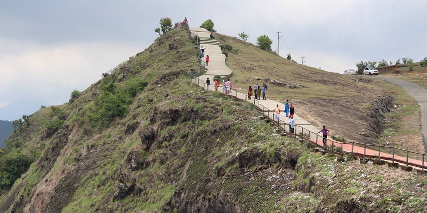 A view of people trekking through the rugged terrains of Parunthumpara, Tamil Nadu.