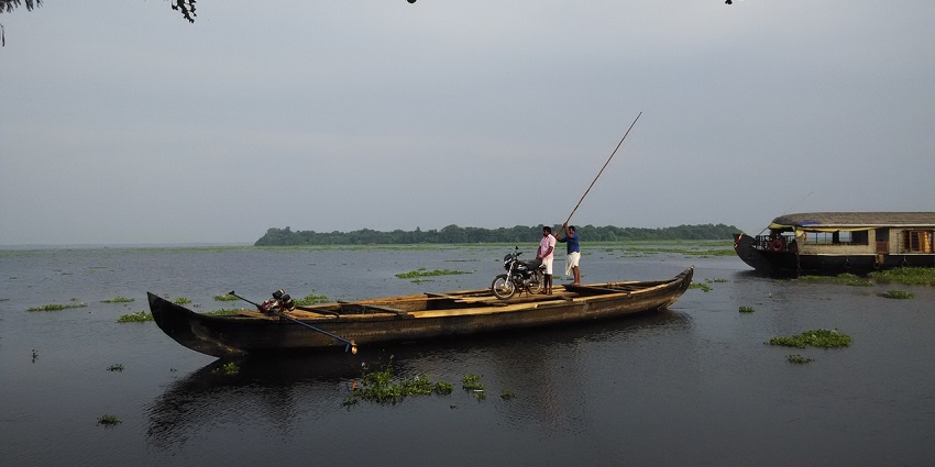Relax on the sandy coasts of Pathiramanal Island near Vembaband Lake, Kottayam, Kerala.