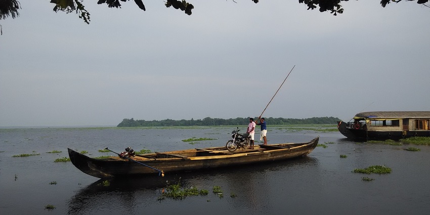 A boat at the shore of Pathiramanal island, a place for a peaceful retreat near Coir museum