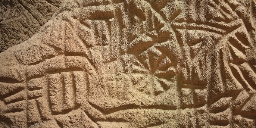 Rock carvings at the Edakkal caves - a top result in the cultural places to visit in Edakkal
