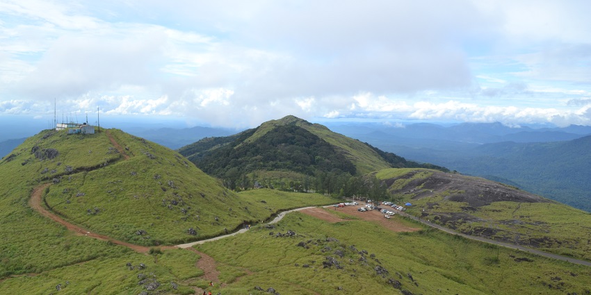 Scenic views, lush green landscapes, and misty mountains - best hill stations near Kollam