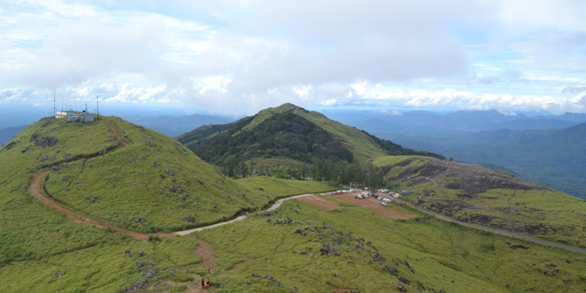 Verdant cliff of Ponmudi hills, a must visit hill station in Trivandrum with family