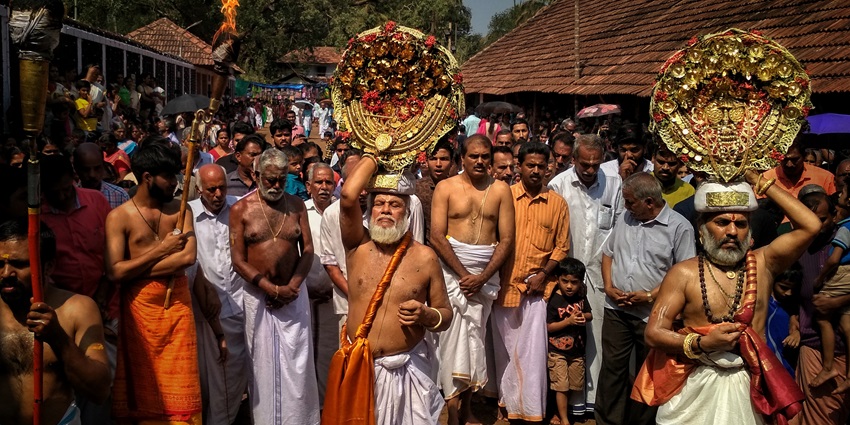 Devotees during the prayers at Taliparamaba Trichambaram Temple in Kerala, India.