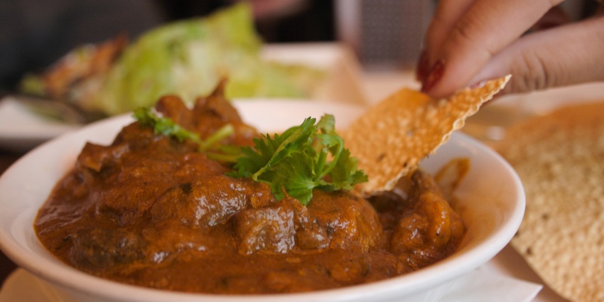 A glimpse of Rogan Josh, a famous dish of Kashmir made of chicken and authentic spices.