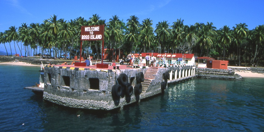 Twin islands connected by a white crescent sandbar in turquoise Andaman waters near karmatang beach