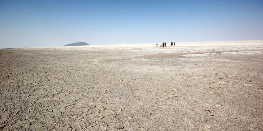 An expansive image of the white salty desert sand of the Great Rann of Kutch in Gujarat