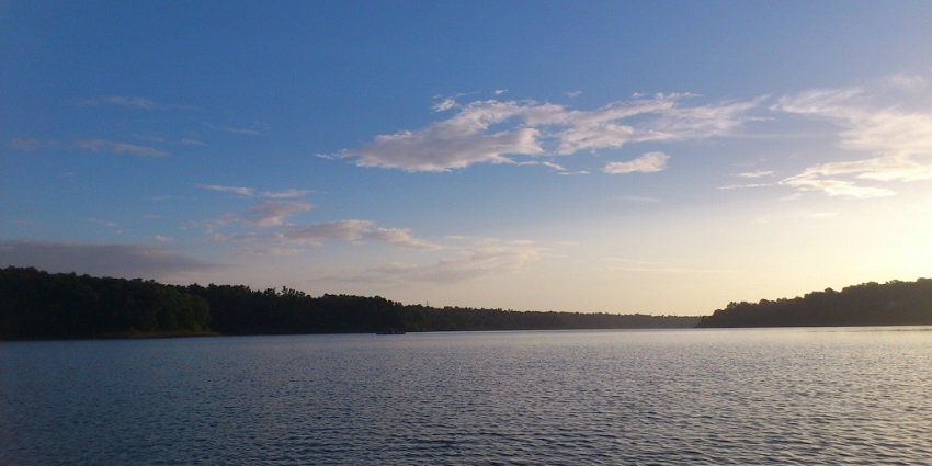 Sunset from the shores of Sasthamkotta Lake one of the best places to visit in Kollam