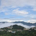 The picturesque views of mountains in Chamba, one of the places to visit in May in India.