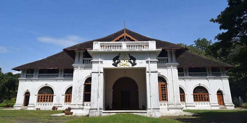 An image of the heritage interiors and garden views of Shakthan Thampuran Palace in Thrissur.