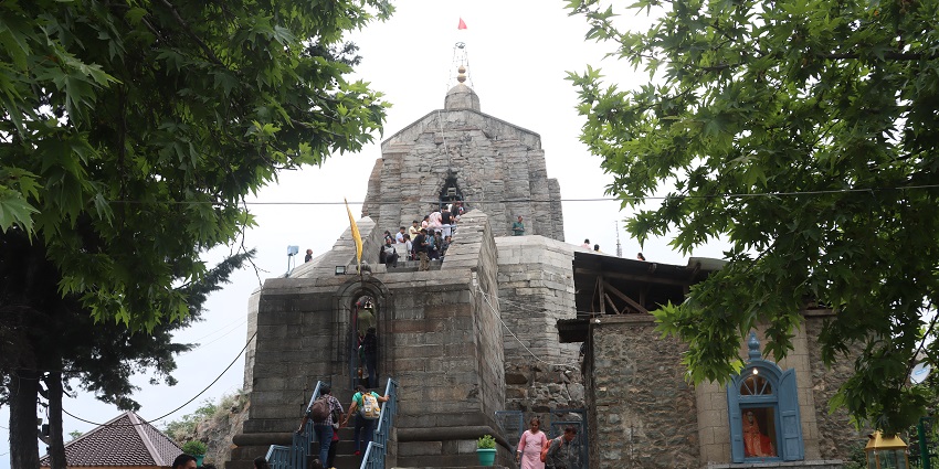 Majestic Shankaracharya Temple atop a hill and devotees with panoramic views of Srinagar