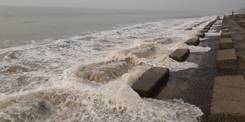 Enjoy peaceful walks and sunset views while exploring the striking Shankarpur Beach.