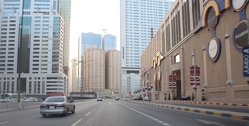 Al Nahda, Sharjah: urban landscape with modern buildings and bustling streets.