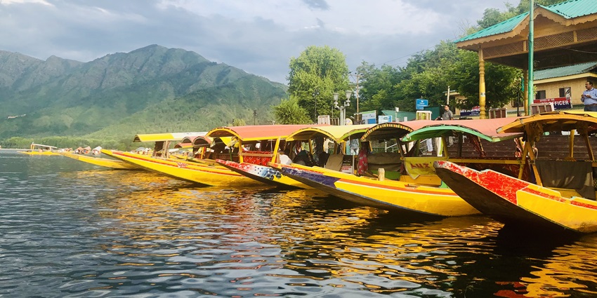 Shikaras, the wooden carved boats on the Dal Lake, one of the places to visit in Srinagar.