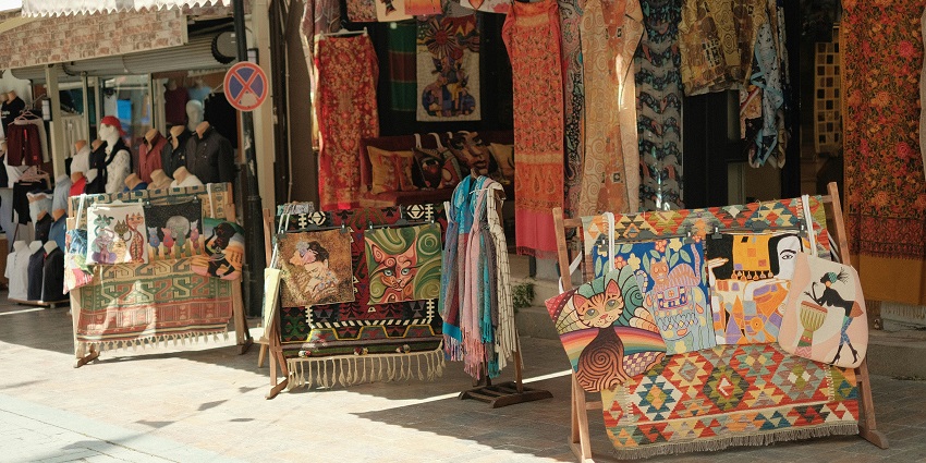 View of shops selling colorful handicrafts within the park premises