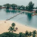 A stunning landscape of Sentosa Island in Singapore covered with lush green trees.