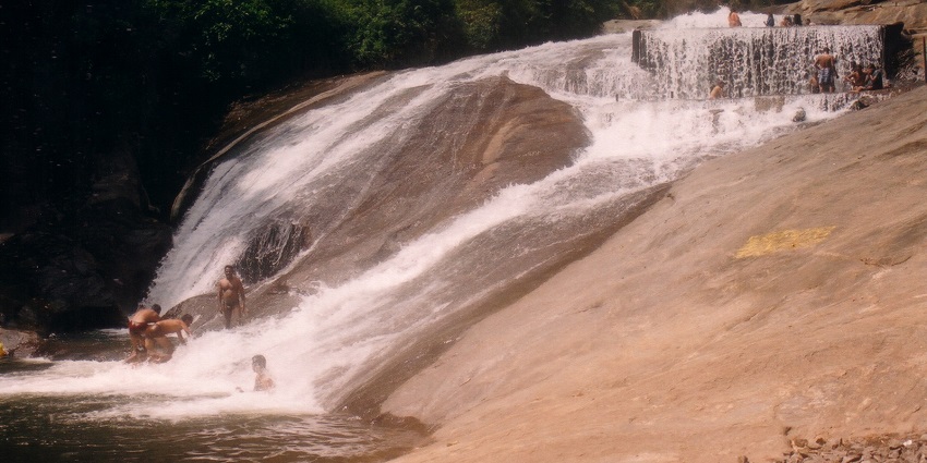 The breathtaking view of a cascade with crystal-clear water and scenic beauty in Kerala.