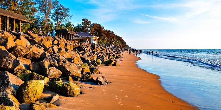 Scenic sunset hues reflecting at Snehatheeram beach offering a perfect coastal view