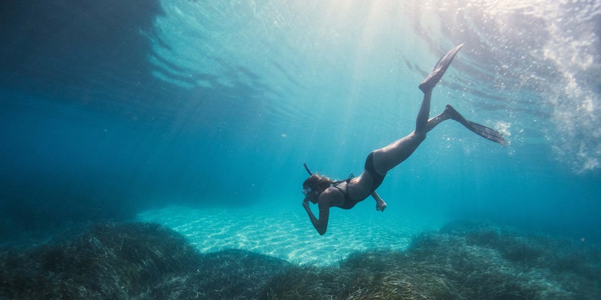Explore the unique underwater world of Andaman as you snorkel in the azure waters.