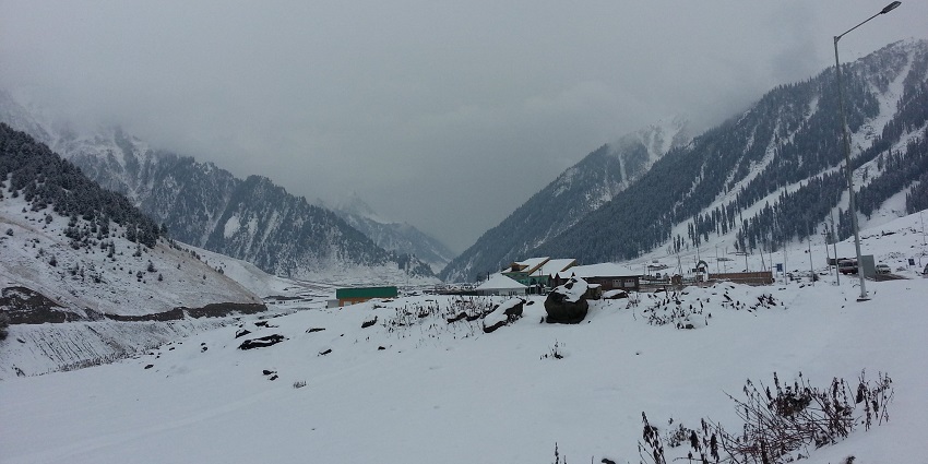 A beautiful view of the snow-covered Mountains and huts in Sonamarg in Kashmir.