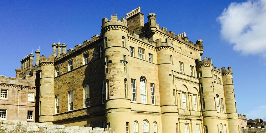 A brown concrete castle in Scotland, one of the places to visit in the world in April