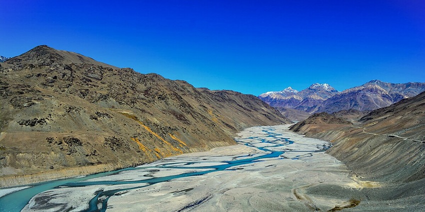 Alluring view of the Spiti river meandering through the hills, ideal place for an escape