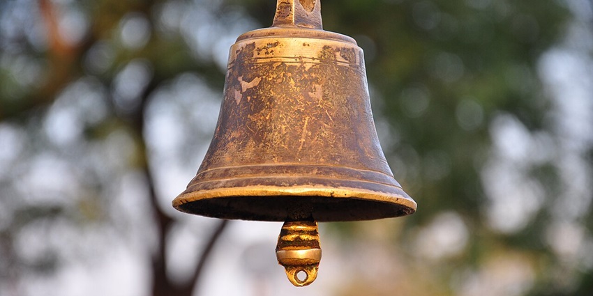 Image of A bell hanging near the water pond at the Thousand Pillar Temple