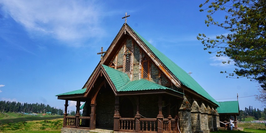 A scenic view of the famous St. Mary’s Church surrounded by lush green vegetation.
