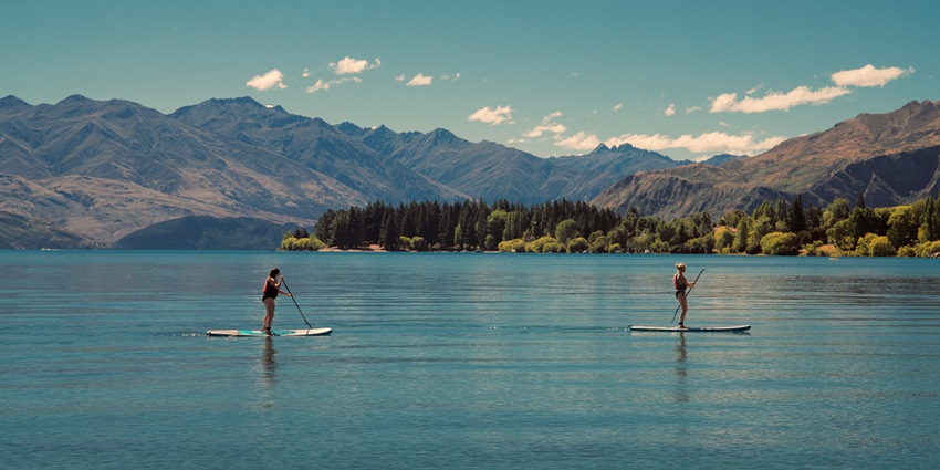 Stand-up paddleboarding is one of the most enjoyable water sports in Dubai for travellers.