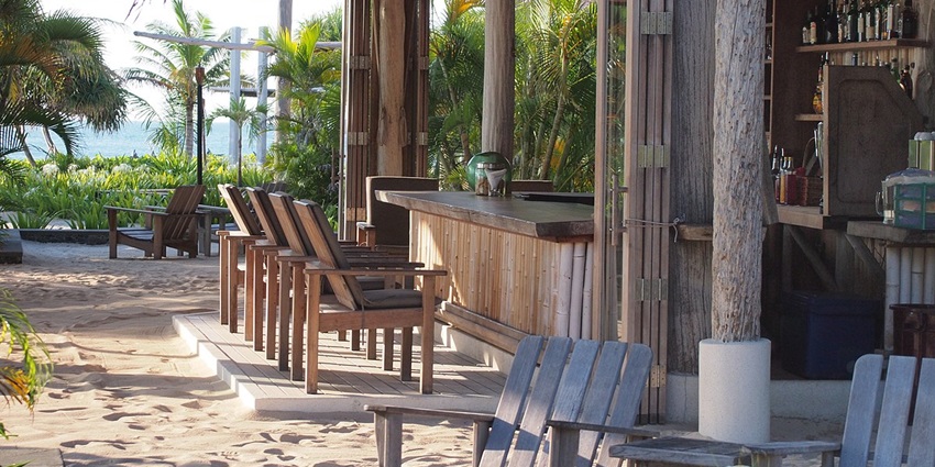 Nikoi Island with pristine beaches, clear waters, and eco-friendly luxury resorts.