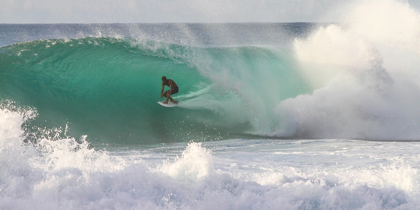 One of the best activities in Kerala for all is surfing for a memorable experience.