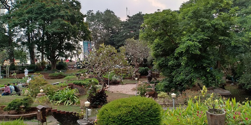 Relax under the lush greenery of Tagore Park, one of the places to travel in Thalassery.