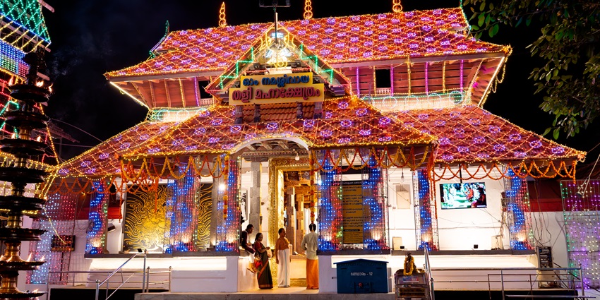 Ancient architecture of Tali Shiva Temple with intricate carvings and sacred surroundings.