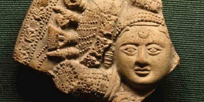 A female terracotta figure with unique hair ornaments in the National Museum of India