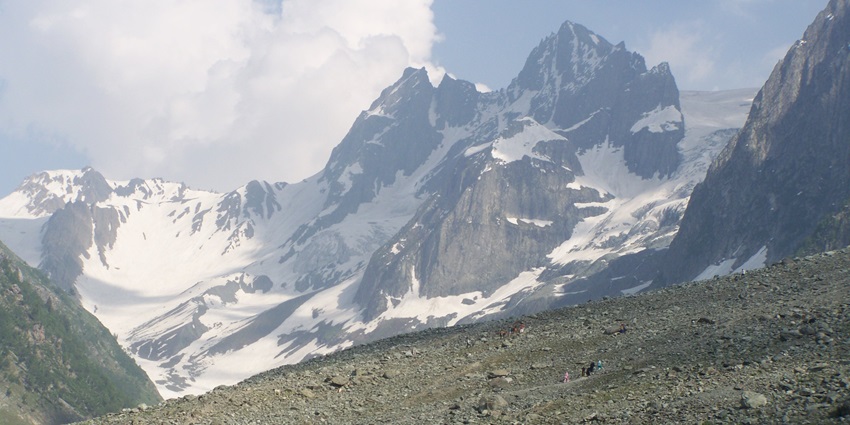 The view of the high peaked, snow-covered mountains around Thajiwas Glacier in Kashmir