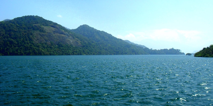 Serene waters of Thenmala dam reservoir- one if the most scenic hill station in Trivandrum