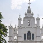 A frontal view of the historic architecture of St. Antony's Church in Kollam, Kerala