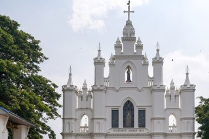 A frontal view of the historic architecture of St. Antony's Church in Kollam, Kerala