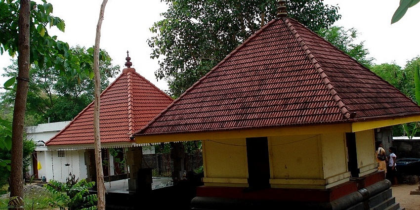 Vilvadrinatha Temple featuring traditional Kerala architecture and peaceful surroundings